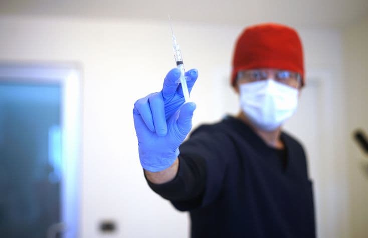 doctor preparing injection